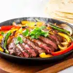 steak fajitas with charred peppers - featured image