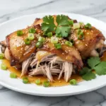 slow cooker honey garlic chicken thighs - featured image
